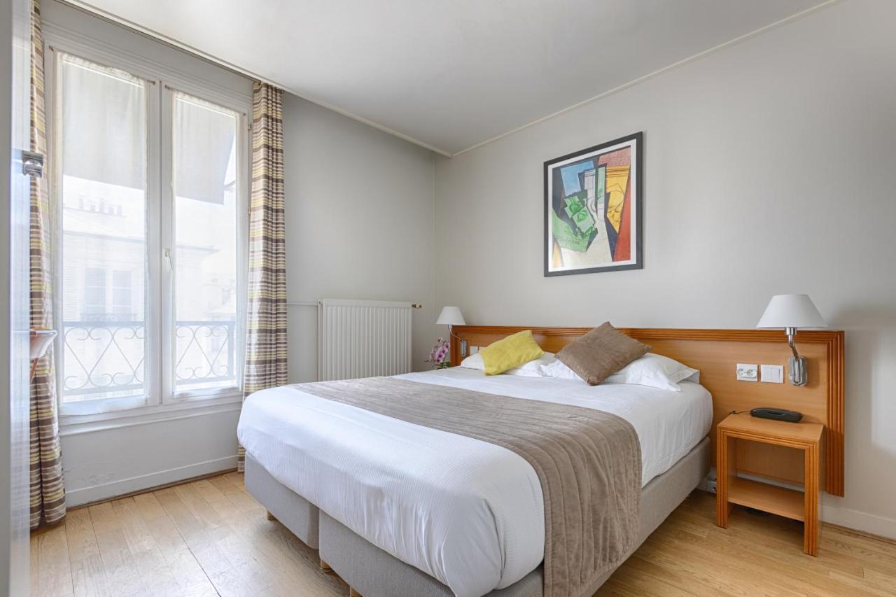 Hotel Le Beaugency Paris Bagian luar foto