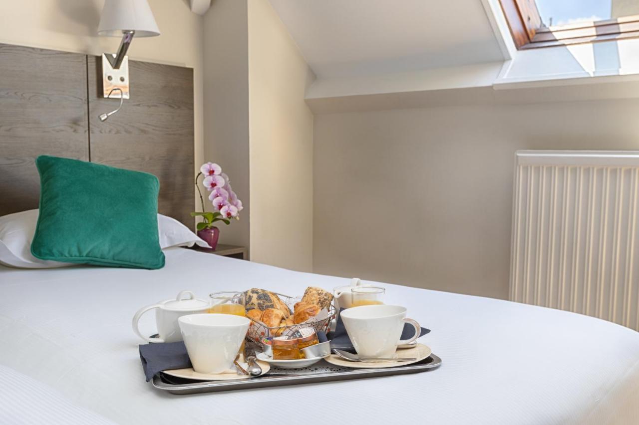 Hotel Le Beaugency Paris Bagian luar foto